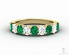 Ivy 1.5 Ct Oval Cut Moissanite and Green Emerald Half Eternity Wedding Band