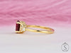 Oval cut red ruby diamond cluster ring side view