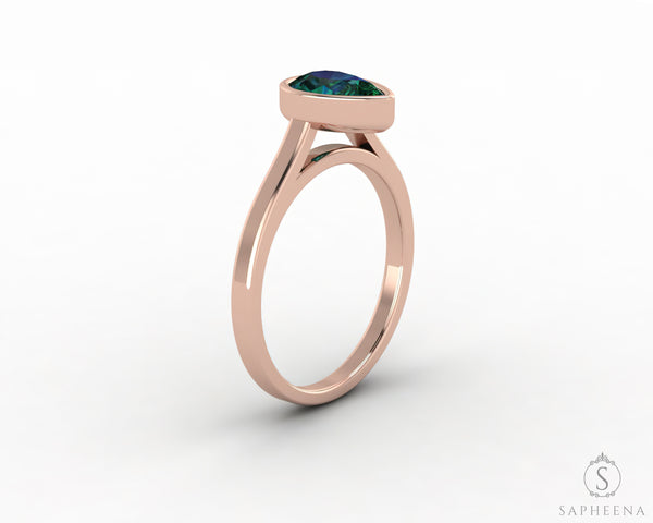 Siara 0.75 Ct Solitaire Pear Cut Green Emerald Engagement Ring
