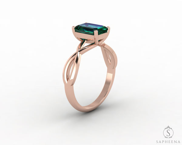 Viola 1.2 Ct Twisted Solitaire Emerald Cut Green Emerald Engagement Ring