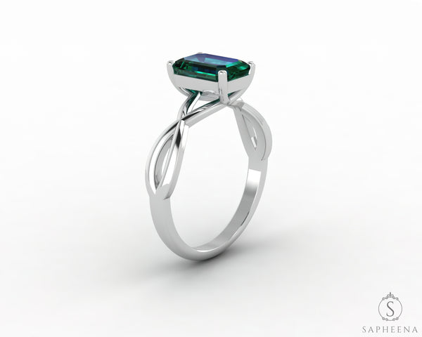 Viola 1.2 Ct Twisted Solitaire Emerald Cut Green Emerald Engagement Ring