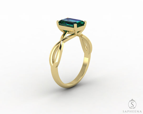 Viola 1.2 Ct Twisted Solitaire Emerald Cut Green Emerald Engagement Ring