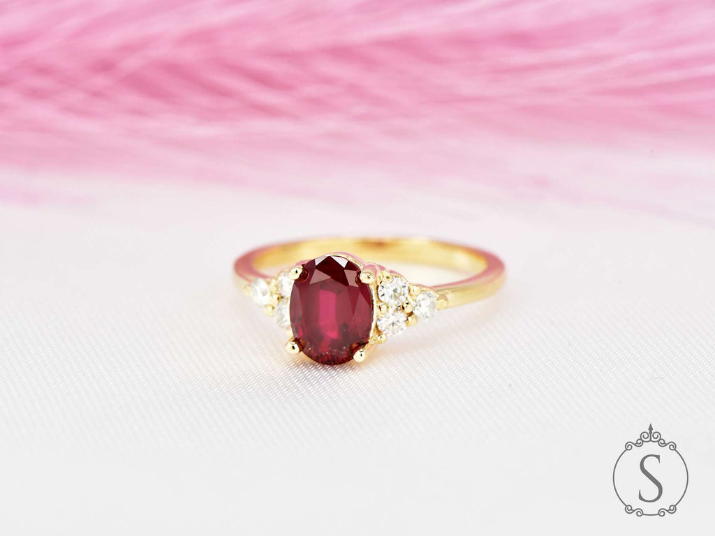 Oval cut red ruby diamond cluster ring front view